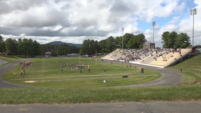 Fans, players and family gather for the Pulaski County football game on Saturday after it was...