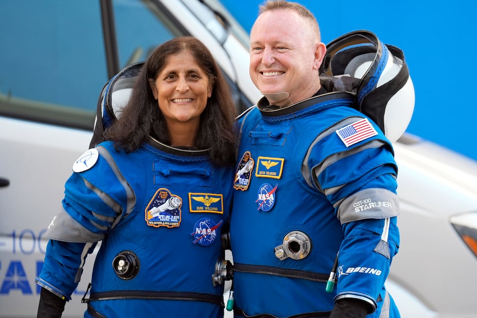 FILE - NASA astronauts Suni Williams, left, and Butch Wilmore stand together for a photo...
