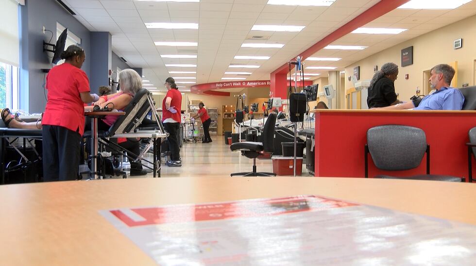 Donors give blood at the American Red Cross donation center.